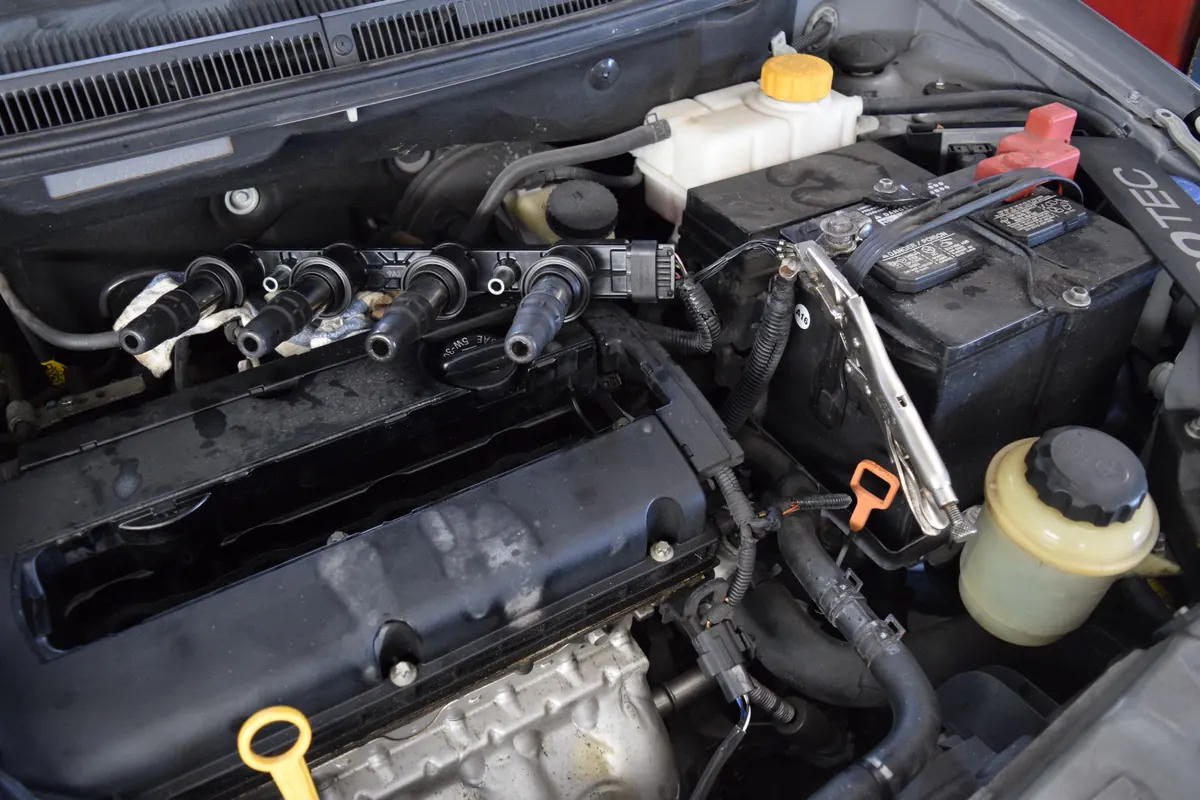 An open engine bay during a repair